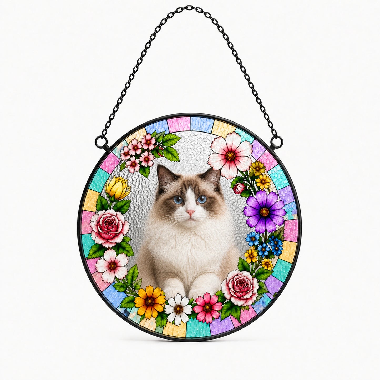 A circular hanging stained-glass-style ornament featuring a fluffy white cat in the center, surrounded by colorful flowers and pastel mosaic panels, suspended by a black chain against a light gray background.