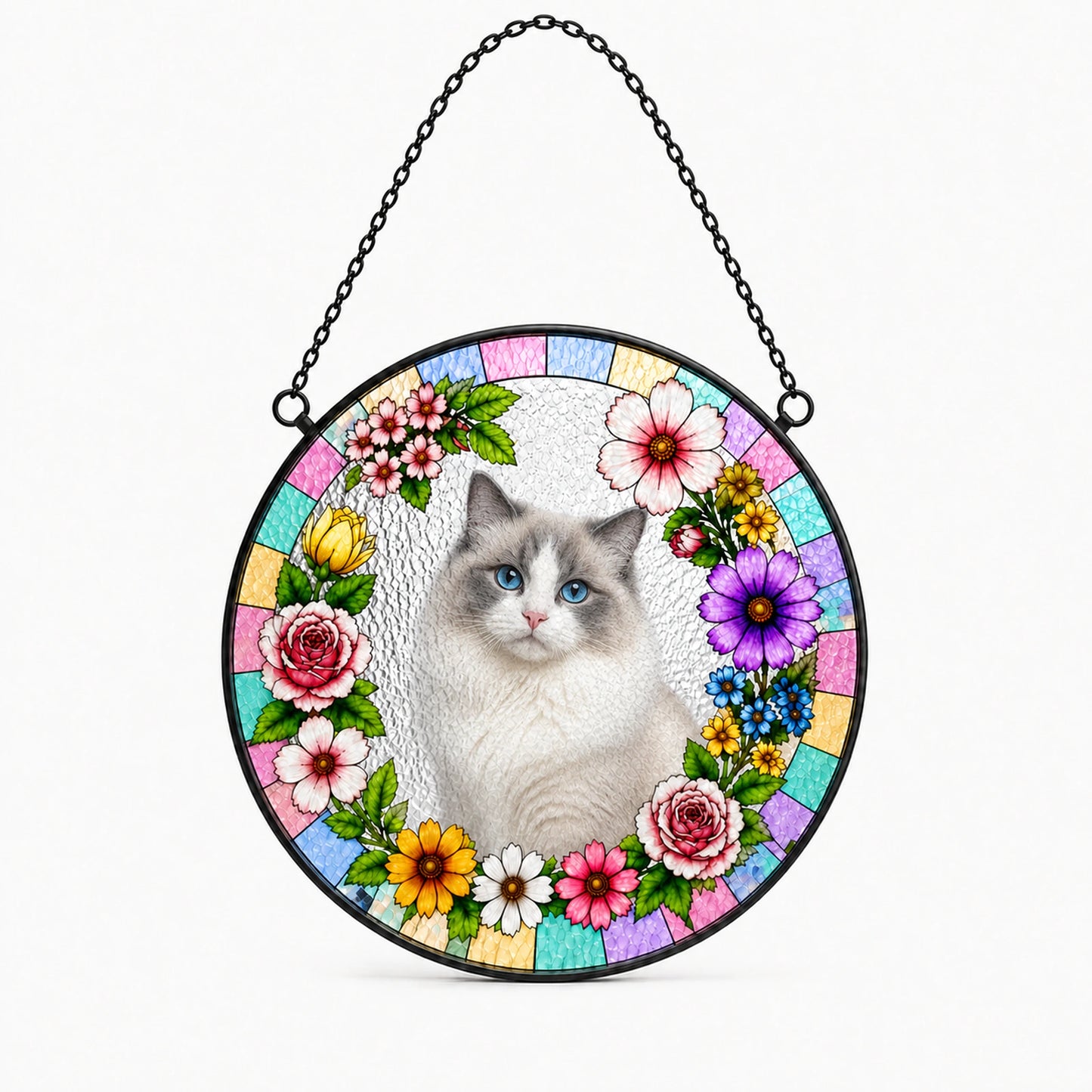 A circular stained-glass-style hanging ornament featuring a white and gray cat in the center, surrounded by colorful flowers and pastel tiles, suspended by a black chain against a light gray background.